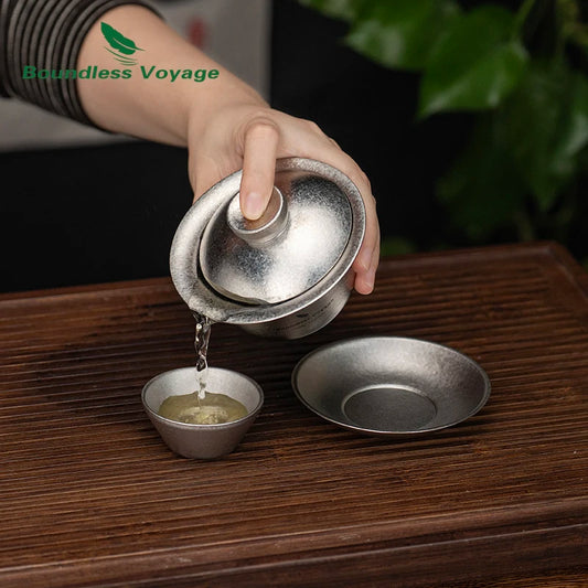 pouring-tea-from-titanium-gaiwan-drip-free-rim