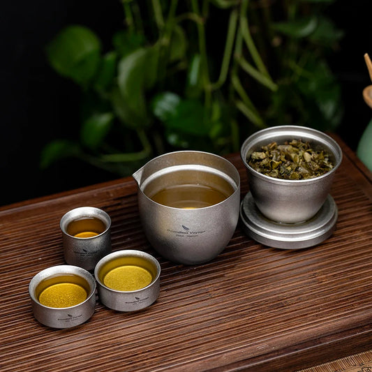 pouring-tea-from-titanium-gongfu-teapot-at-campsite