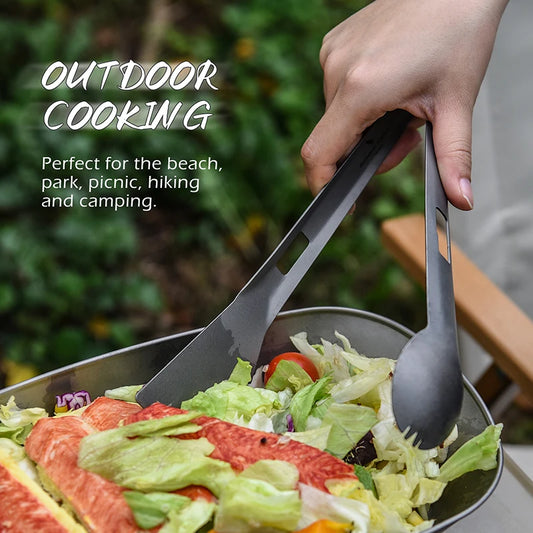 using-titanium-tongs-to-flip-food-on-campfire-grill