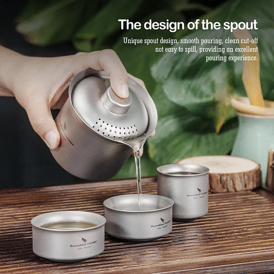 pouring-tea-from-portable-titanium-set-at-campsite