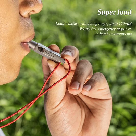 titanium-whistle-attached-to-backpack-for-hiking