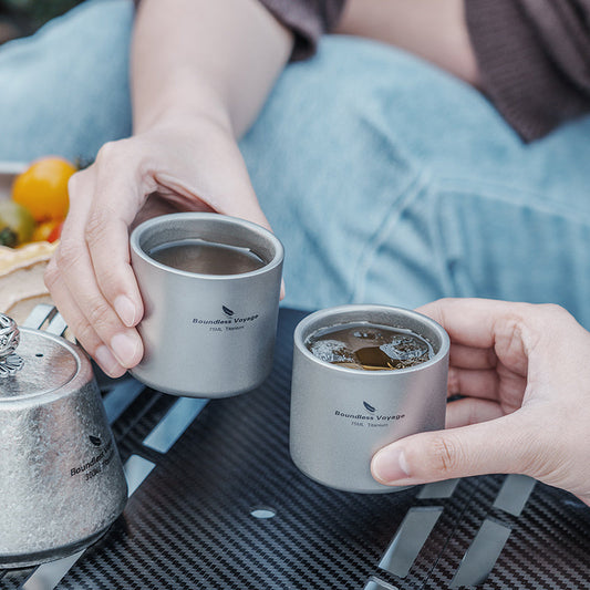 Sip in Comfort: The Boundless Voyage Double-Wall Titanium Mug