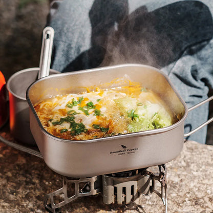 stove-safe-titanium-mess-tin-being-heated-on-campfire