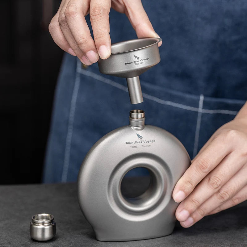 filtering-coffee-with-titanium-funnel-and-strainer