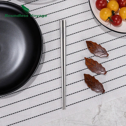 using-titanium-chopsticks-to-pick-up-noodles