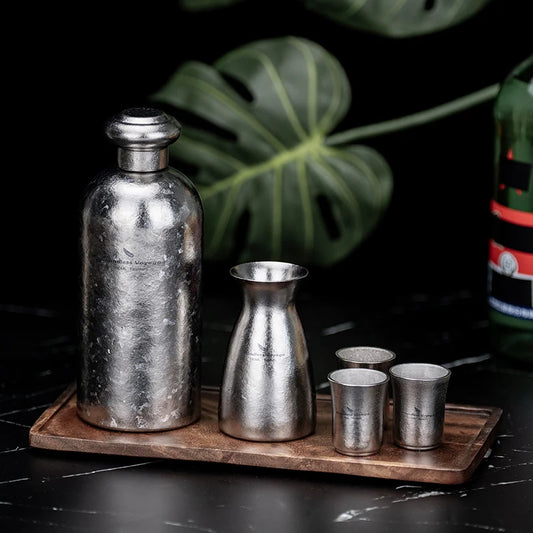 pouring-sake-from-titanium-decanter