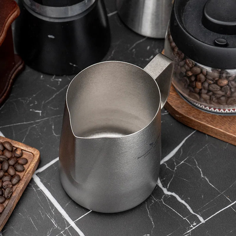 ergonomic-double-arc-handle-on-titanium-coffee-pitcher