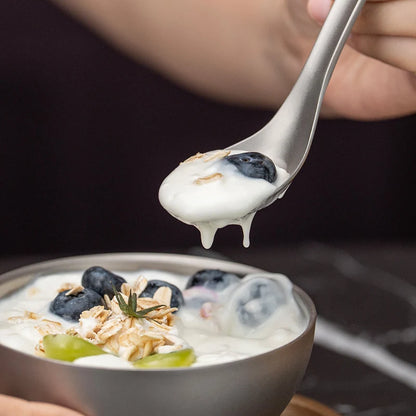 using-titanium-spoon-to-eat-soup-at-campsite