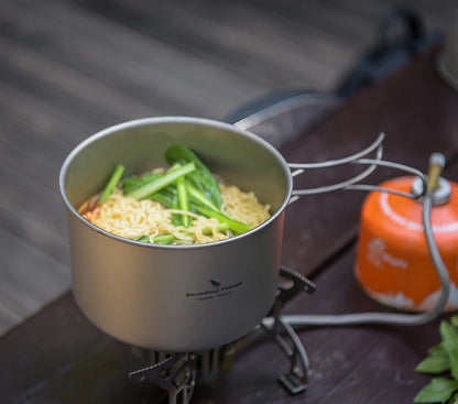 cooking-meal-with-titanium-pan-over-camp-stove