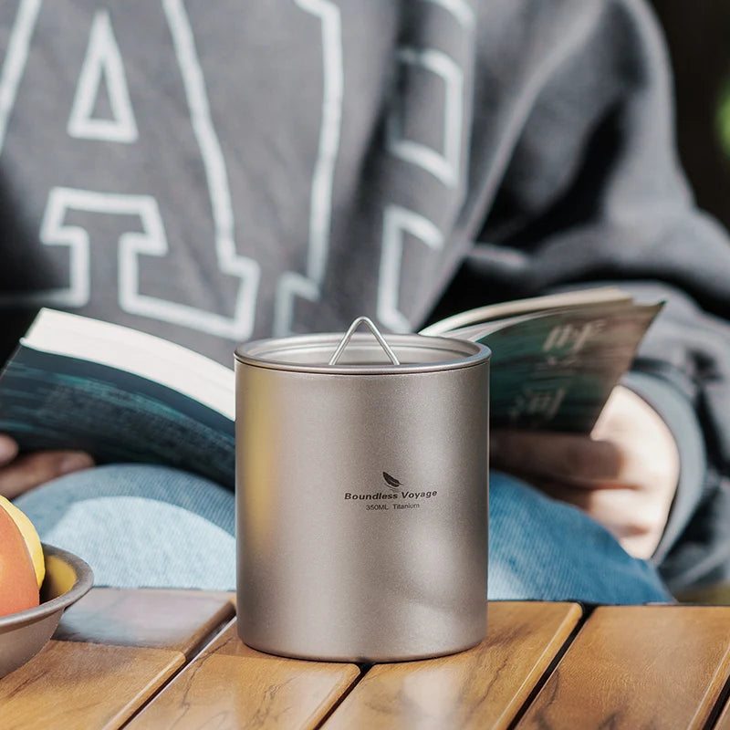 drinking-coffee-from-titanium-cup-at-campsite