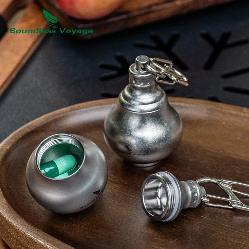 titanium-pill-container-attached-to-backpack-for-travel