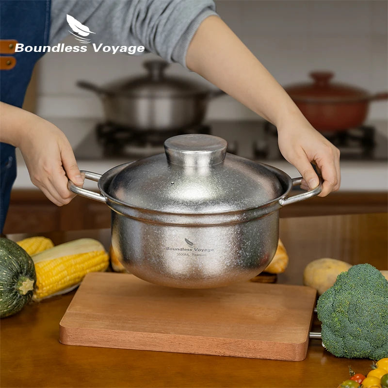 cooking-family-meal-in-large-titanium-soup-pot