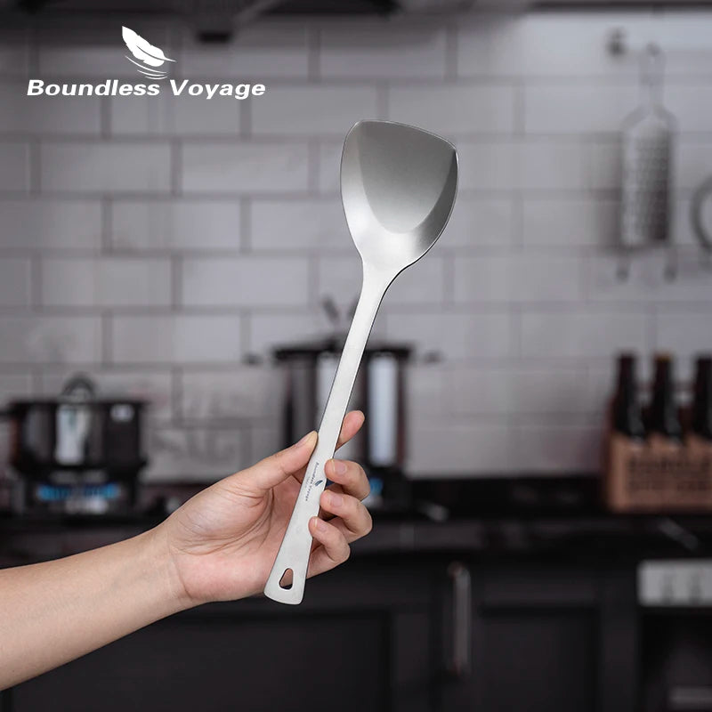 using-titanium-spatula-to-flip-pancake-on-griddle