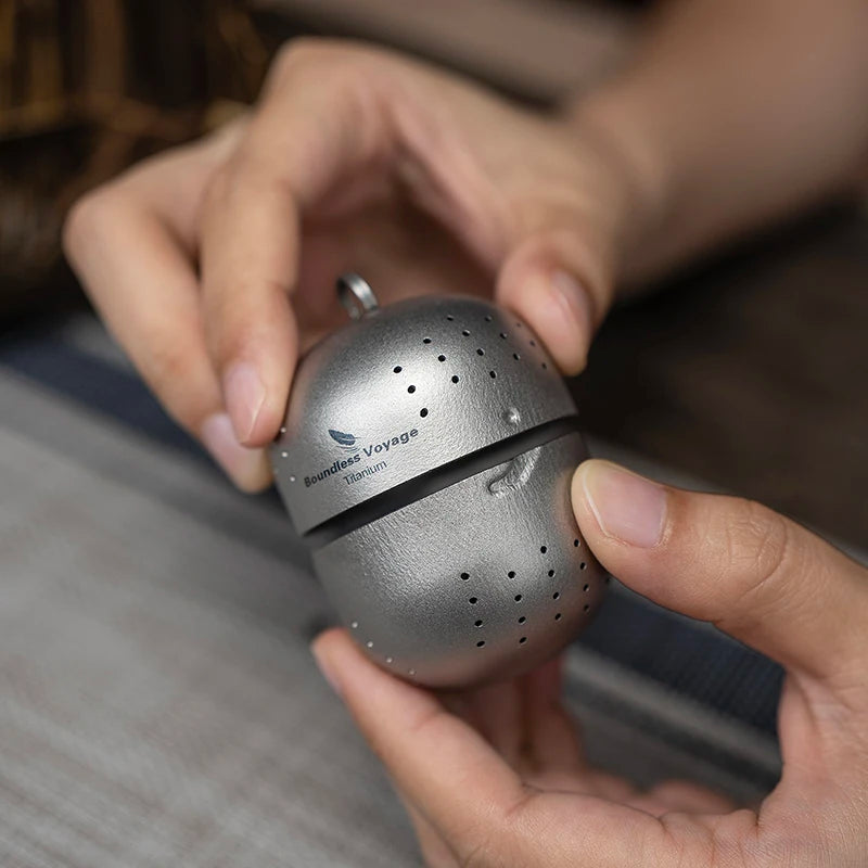 titanium-tea-infuser-with-3-slot-locking-lid