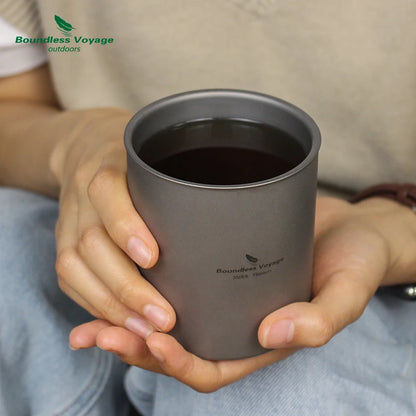 drinking-coffee-from-titanium-cup-at-campsite