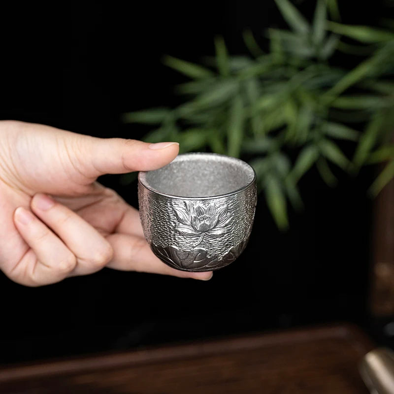 titanium-cup-with-fish-and-leaf-embossed-texture
