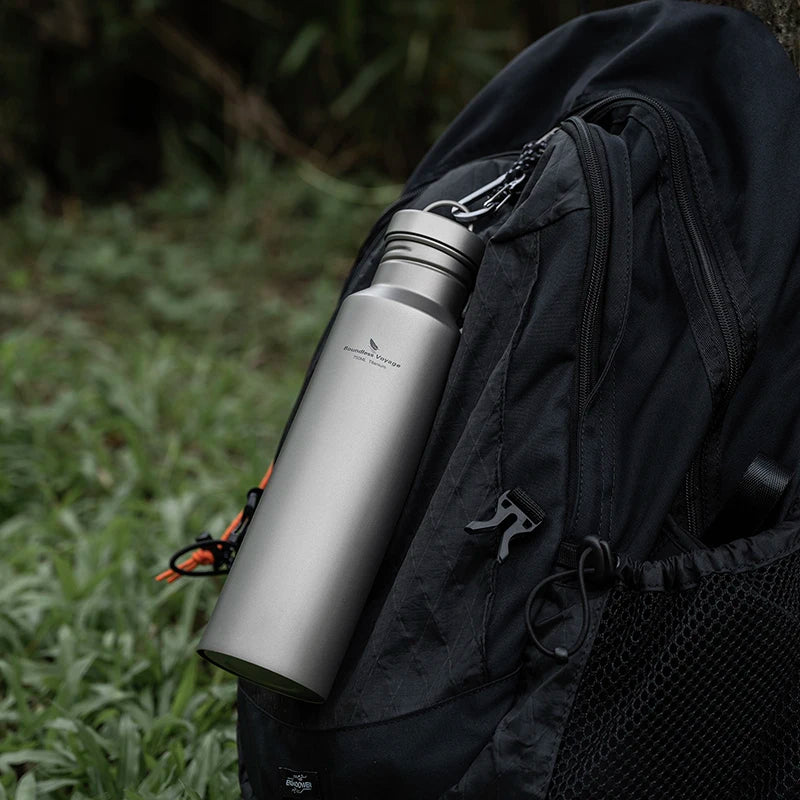 titanium-water-bottle-in-backpack-for-hiking