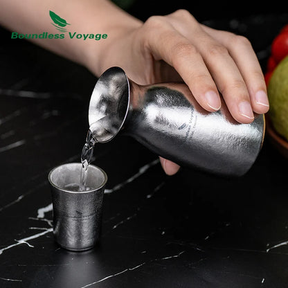 pouring-sake-from-titanium-decanter
