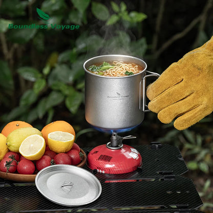 titanium-cup-being-heated-over-campfire-as-pot