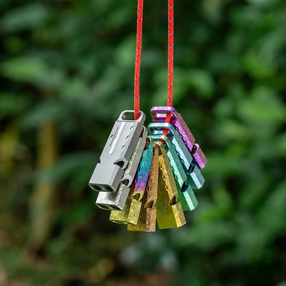 titanium-whistle-attached-to-backpack-for-hiking-safety