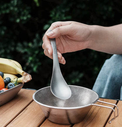 using-titanium-soup-spoon-for-hearty-meal
