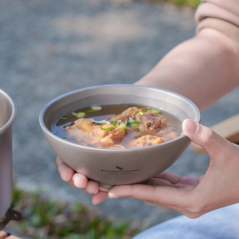 family-using-titanium-bowls-at-camping-meal