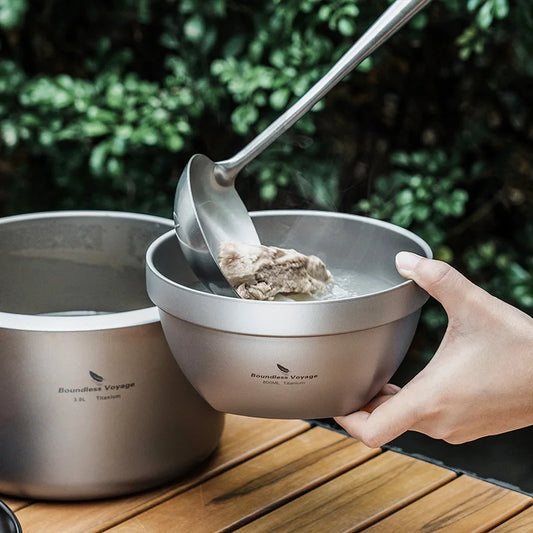 eating-soup-from-titanium-bowl-at-campsite