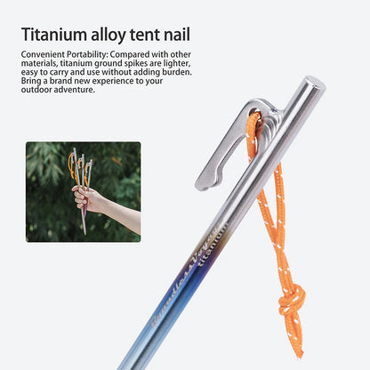 securing-tent-with-titanium-pegs-on-rocky-ground