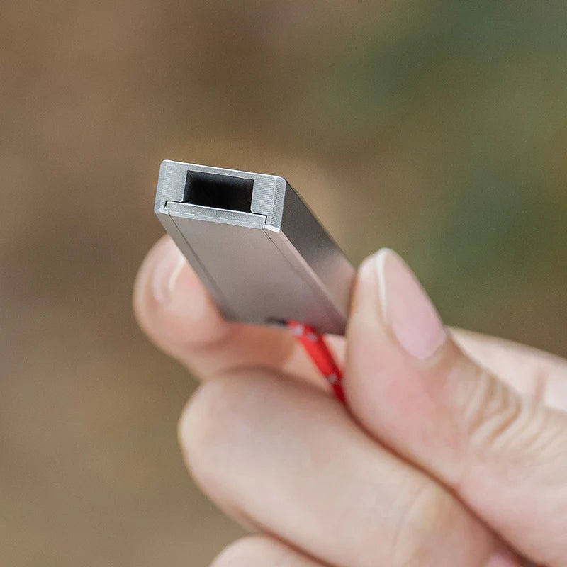 pea-less-titanium-whistle-works-in-all-weather